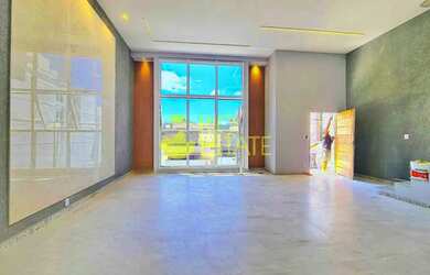 Imagem: A casa possui 3 Dormitórios, 4 Banheiros, 2 Vagas na garagem