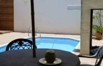 Imagem: A casa possui 4 Dormitórios, 4 Banheiros, 2 Vagas na garagem