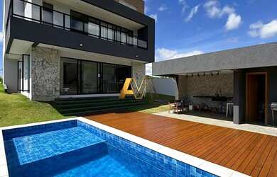 Imagem: A casa em condomínio possui 4 Dormitórios, 5 Banheiros, 4