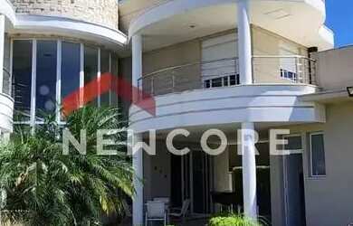 Imagem: A casa possui 4 Dormitórios, 5 Banheiros, 3 Vagas na garagem