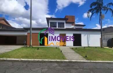 Imagem: A casa em condomínio possui 4 Dormitórios, 5 Banheiros, 4