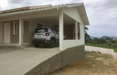 Imagem: A casa possui 2 Dormitórios, 1 Banheiro, 1 Vaga na garagem