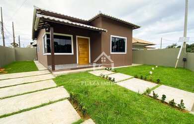 Imagem: A casa possui 3 Dormitórios, 2 Banheiros, 1 Vaga na garagem