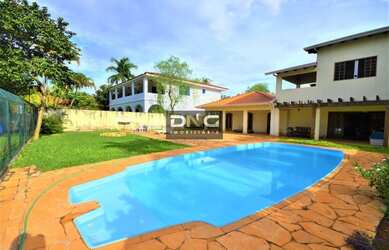 Imagem: A casa possui 5 Dormitórios, 5 Banheiros, 5 Vagas na garagem