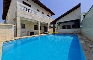 Imagem: A casa em condomínio possui 5 Dormitórios, 5 Banheiros, 5