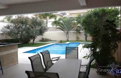 Imagem: A casa em condomínio possui 5 Dormitórios, 5 Banheiros, 5