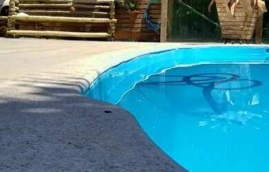 Imagem: A casa possui 3 Dormitórios, 5 Banheiros, 2 Vagas na garagem