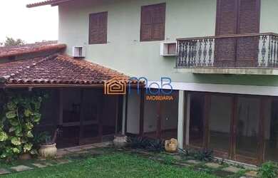 Imagem: A casa possui 5 Dormitórios, 5 Banheiros, 2 Vagas na garagem