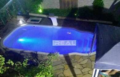 Imagem: A casa em condomínio possui 4 Dormitórios, 2 Banheiros, 1