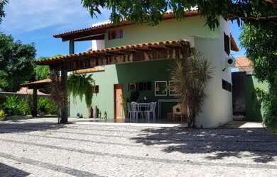 Imagem: A casa possui 5 Dormitórios, 5 Banheiros, 5 Vagas na garagem