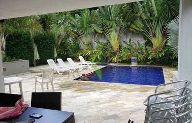 Imagem: A casa possui 5 Dormitórios, 5 Banheiros, 3 Vagas na garagem