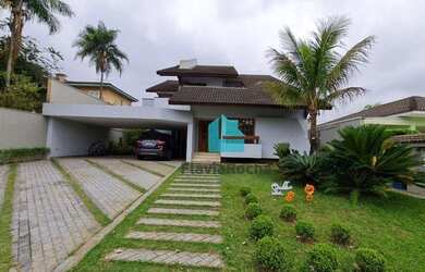 Imagem: A casa em condomínio possui 4 Dormitórios, 5 Banheiros, 5