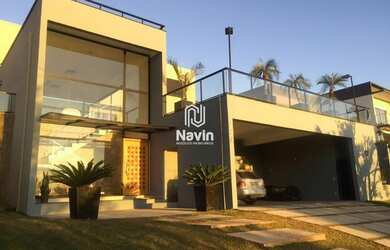 Imagem: A casa em condomínio possui 5 Dormitórios, 5 Banheiros, 5