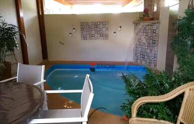 Imagem: A casa em condomínio possui 4 Dormitórios, 5 Banheiros, 2