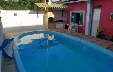 Imagem: A casa possui 4 Dormitórios, 1 Vaga na garagem e está localizado