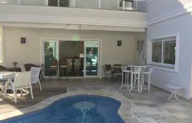 Imagem: A casa em condomínio possui 5 Dormitórios, 5 Banheiros, 5