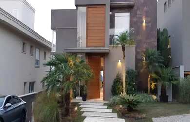 Imagem: A casa em condomínio possui 4 Dormitórios, 5 Banheiros, 5