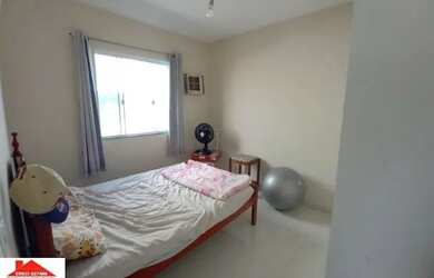 Imagem: A casa possui 4 Dormitórios, 2 Banheiros, 3 Vagas na garagem