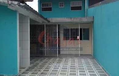 Imagem: A casa possui 3 Dormitórios, 2 Banheiros, 4 Vagas na garagem