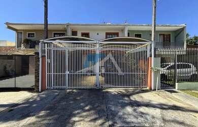 Imagem: A casa possui 3 Dormitórios, 2 Banheiros, 2 Vagas na garagem