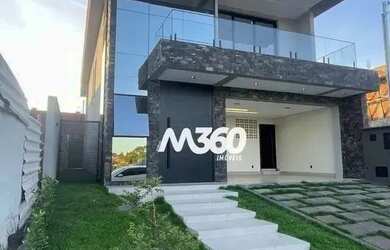 Imagem: A casa possui 4 Dormitórios, 5 Banheiros, 4 Vagas na garagem