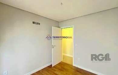 Imagem 11: Casa em Porto Alegre, no bairro Hípica, com 3 dormitório s , e 3 banheiros,...