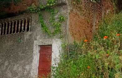 Imagem: A casa possui 3 Dormitórios, 3 Banheiros, 2 Vagas na garagem