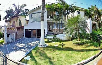 Imagem: A casa em condomínio possui 3 Dormitórios, 5 Banheiros, 2