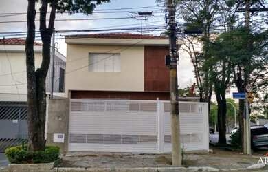 Imagem: A casa possui 3 Dormitórios, 4 Banheiros, 5 Vagas na garagem