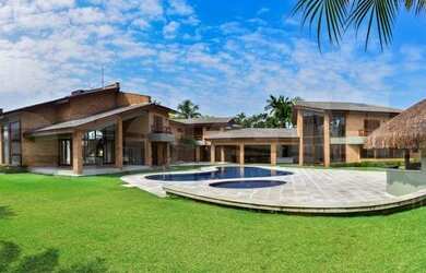 Imagem: A casa possui 5 Dormitórios, 5 Banheiros, 5 Vagas na garagem