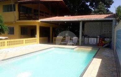 Imagem: A casa em condomínio possui 5 Dormitórios, 5 Banheiros, 5