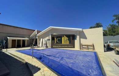 Imagem: A casa em condomínio possui 3 Dormitórios, 1 Banheiro e 400m²