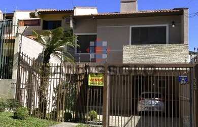 Imagem: A casa possui 4 Dormitórios, 4 Banheiros, 3 Vagas na garagem