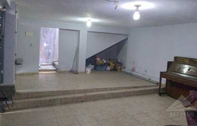 Imagem: A casa possui 4 Dormitórios, 2 Banheiros, 3 Vagas na garagem