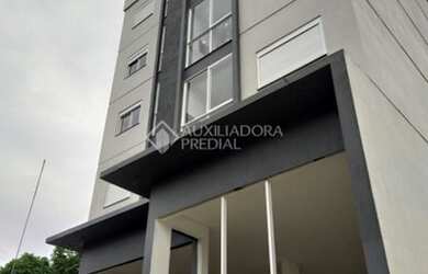 Imagem: O apartamento possui 2 Dormitórios, 1 Banheiro, 2 Vagas na