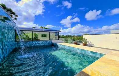 Imagem: A casa em condomínio possui 5 Dormitórios, 5 Banheiros, 4