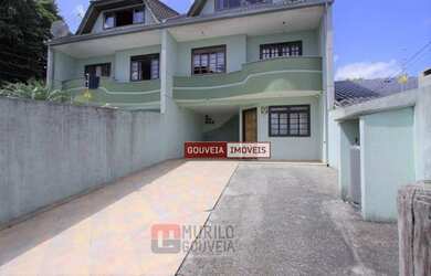 Imagem: A casa possui 3 Dormitórios, 3 Banheiros, 4 Vagas na garagem