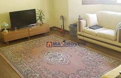 Imagem: A casa em condomínio possui 4 Dormitórios, 5 Banheiros, 414m²