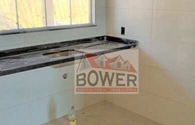 Imagem: A casa possui 2 Dormitórios, 1 Banheiro, 2 Vagas na garagem