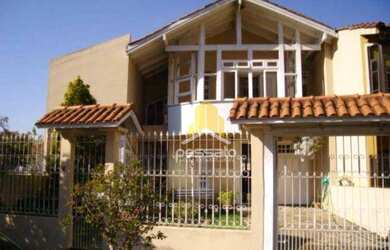 Imagem: A casa possui 5 Dormitórios, 5 Banheiros, 5 Vagas na garagem