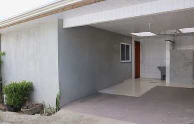 Imagem: A casa possui 2 Dormitórios, 1 Banheiro, 1 Vaga na garagem