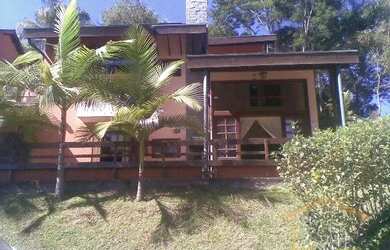 Imagem: A casa em condomínio à venda possui 2 Dormitórios, 4 Banheiros