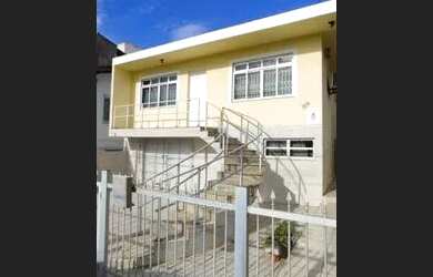 Imagem: A casa possui 3 Dormitórios, 2 Banheiros, 3 Vagas na garagem