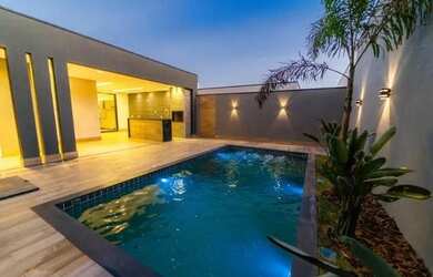 Imagem: A casa em condomínio possui 4 Dormitórios, 5 Banheiros, 4