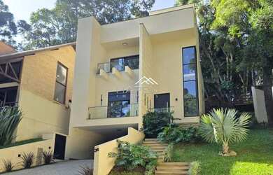 Imagem: A casa em condomínio possui 3 Dormitórios, 5 Banheiros, 4