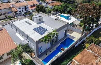 Imagem: A casa possui 5 Dormitórios, 5 Banheiros, 2 Vagas na garagem