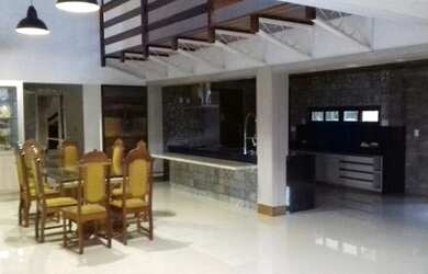 Imagem: A casa em condomínio possui 4 Dormitórios e está localizado