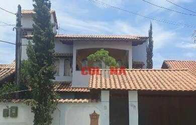 Imagem: A casa possui 4 Dormitórios, 5 Banheiros, 2 Vagas na garagem