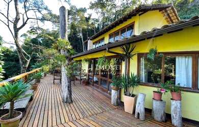 Imagem: A casa em condomínio à venda possui 3 Dormitórios, 4 Banheiros