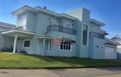 Imagem: A casa em condomínio possui 3 Dormitórios, 5 Banheiros, 4